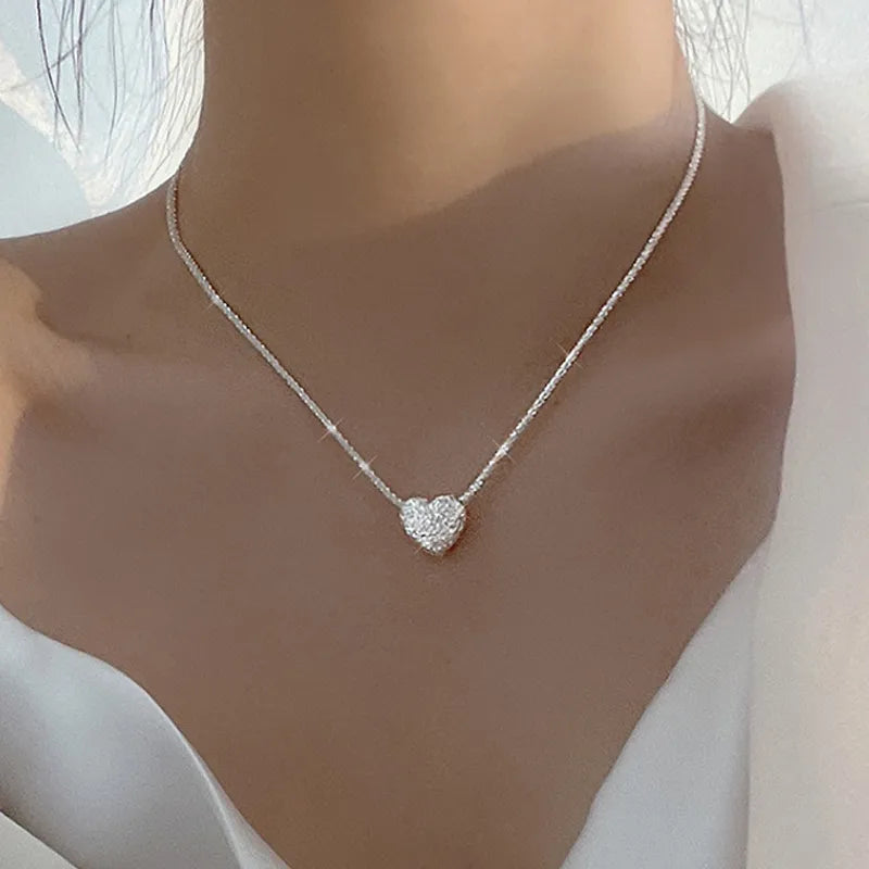 SILVER NECKLACE WITH HEART PENDANT