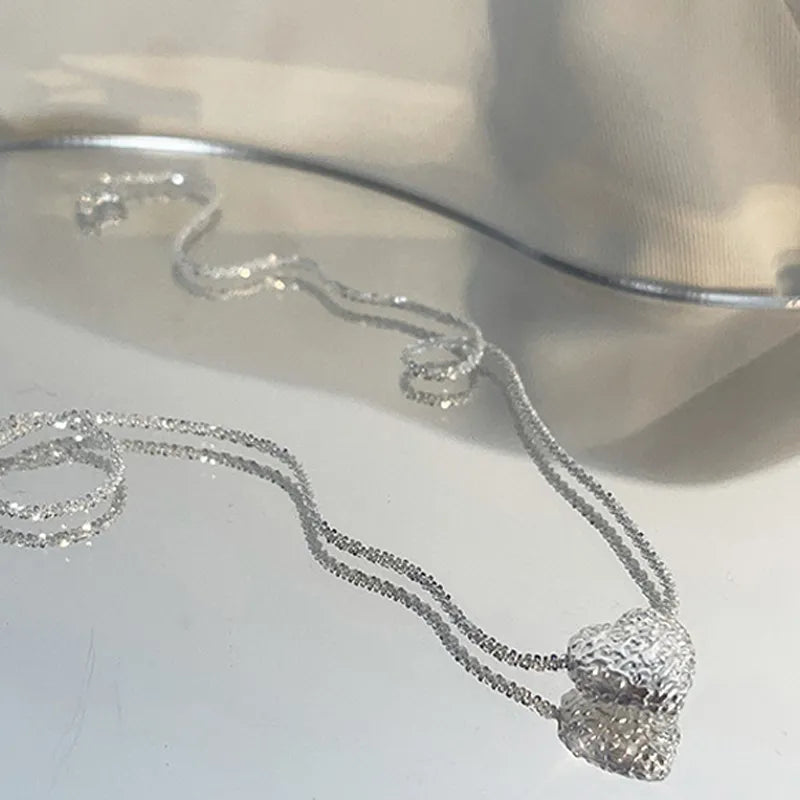 SILVER NECKLACE WITH HEART PENDANT