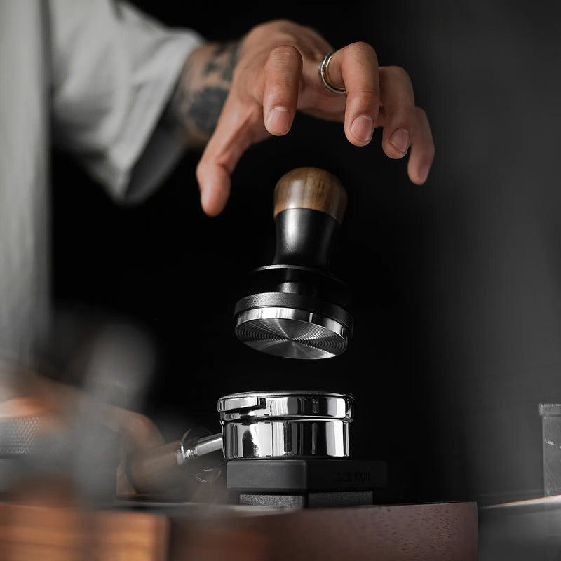 Coffee Tamper: Calibrated coffee tamper